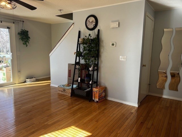 55 Empire Street, Unit 52 Chicopee, MA 01013 - Photo 14 of 18 a view of a room with wooden floor and stairs