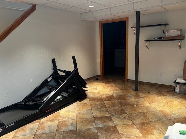 55 Empire Street, Unit 52 Chicopee, MA 01013 - Photo 17 of 18 a room with a black white checkered floor