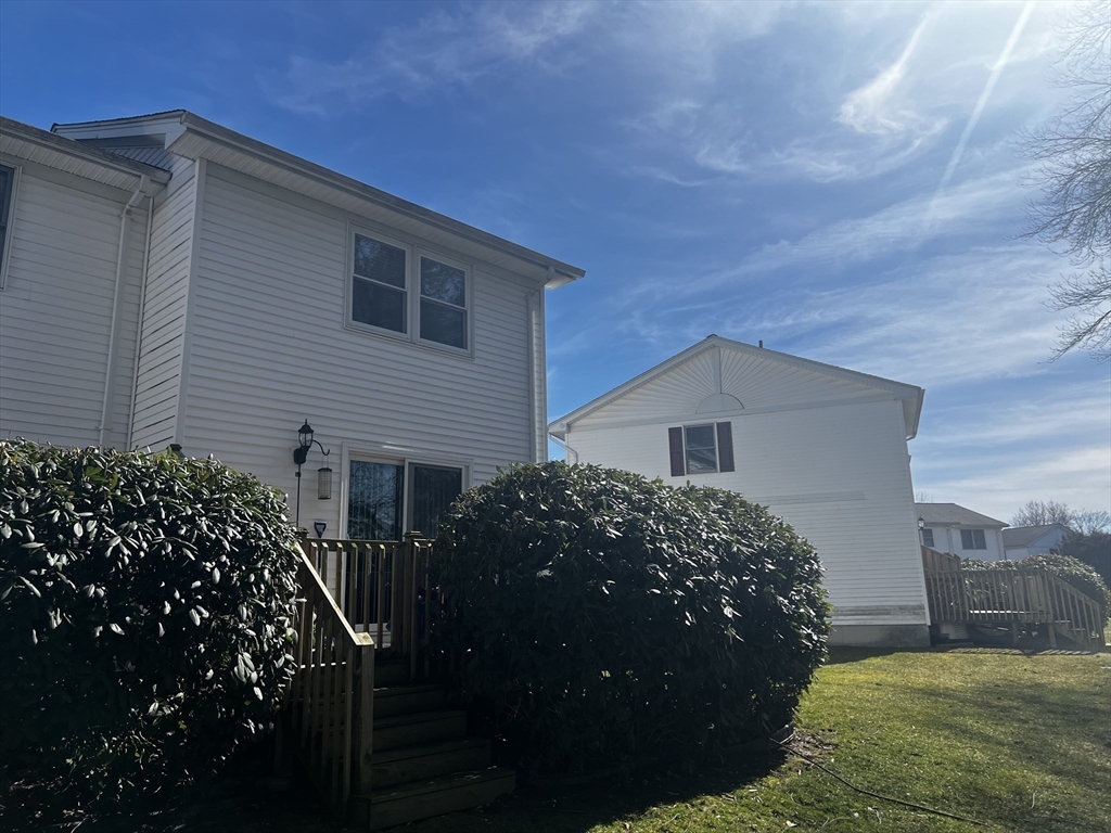 55 Empire Street, Unit 52 Chicopee, MA 01013 - Photo 6 of 18 a view of a house with a garden