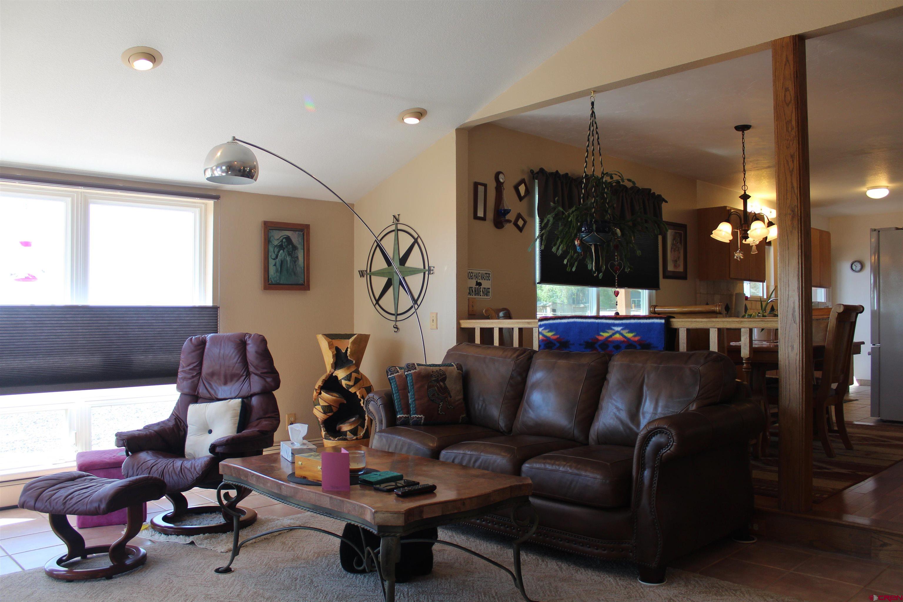 13762 F Road Delta, CO 81416 - Photo 11 of 34 a living room with furniture and wooden floor