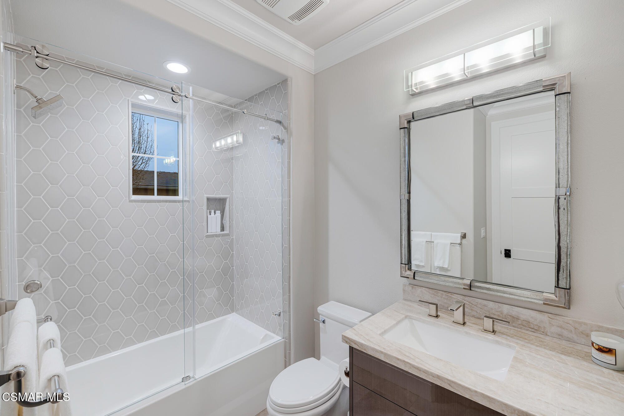 6508 High Country Place Moorpark, CA 93021 - Photo 26 of 95 a bathroom with a sink toilet and shower