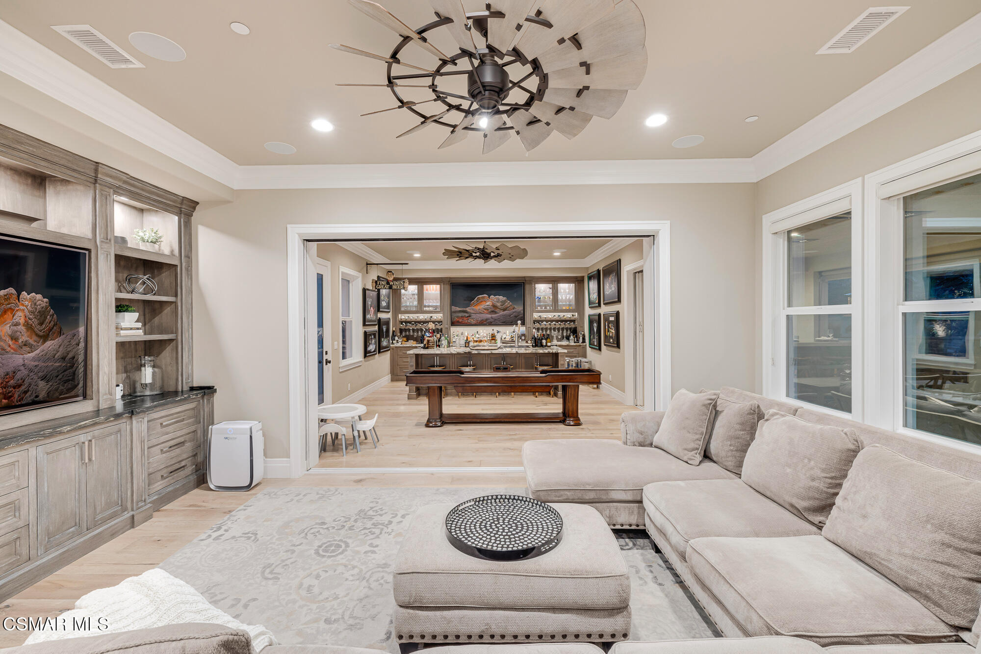 6508 High Country Place Moorpark, CA 93021 - Photo 35 of 95 a living room with furniture and a flat screen tv