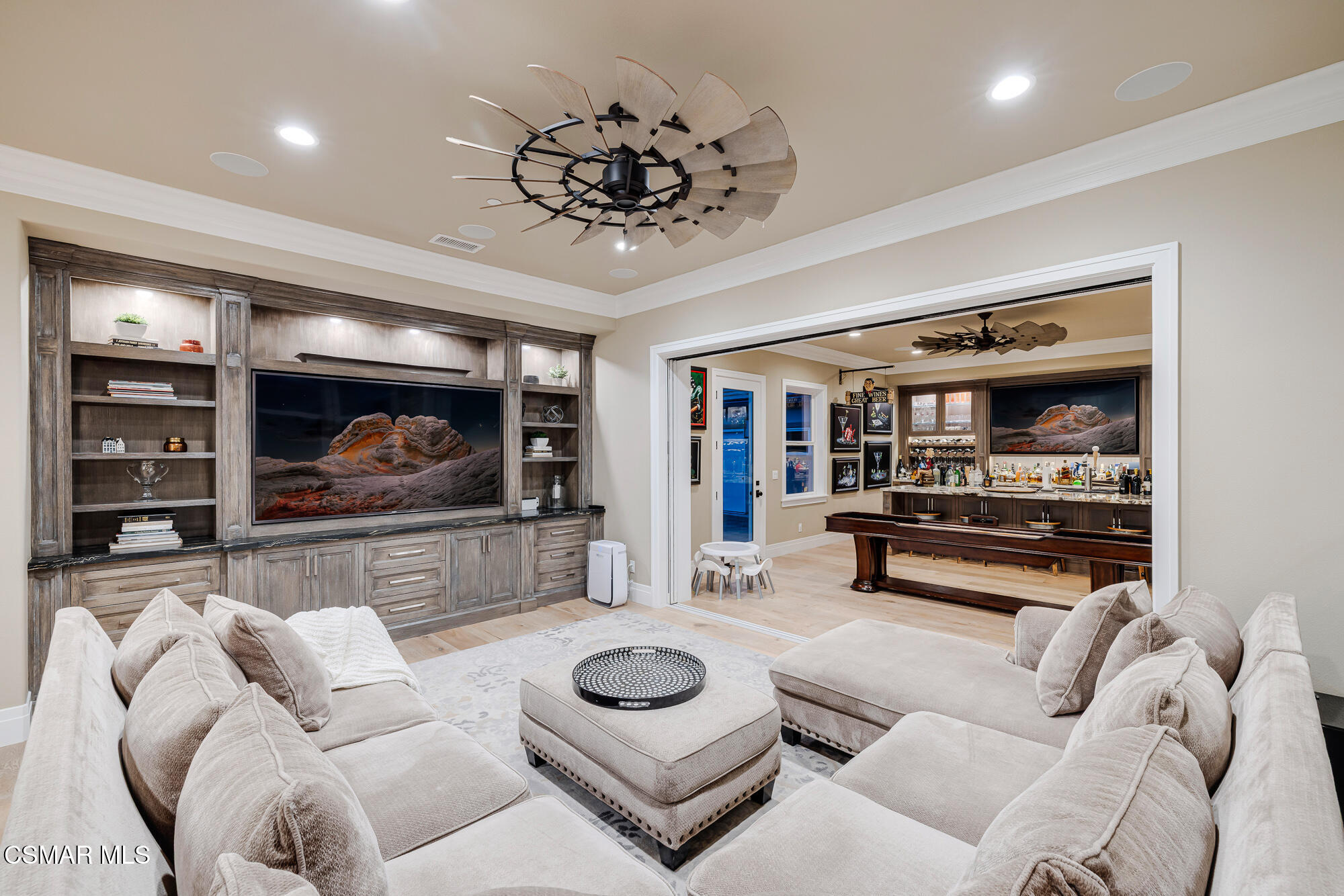 6508 High Country Place Moorpark, CA 93021 - Photo 36 of 95 a living room with furniture and a flat screen tv