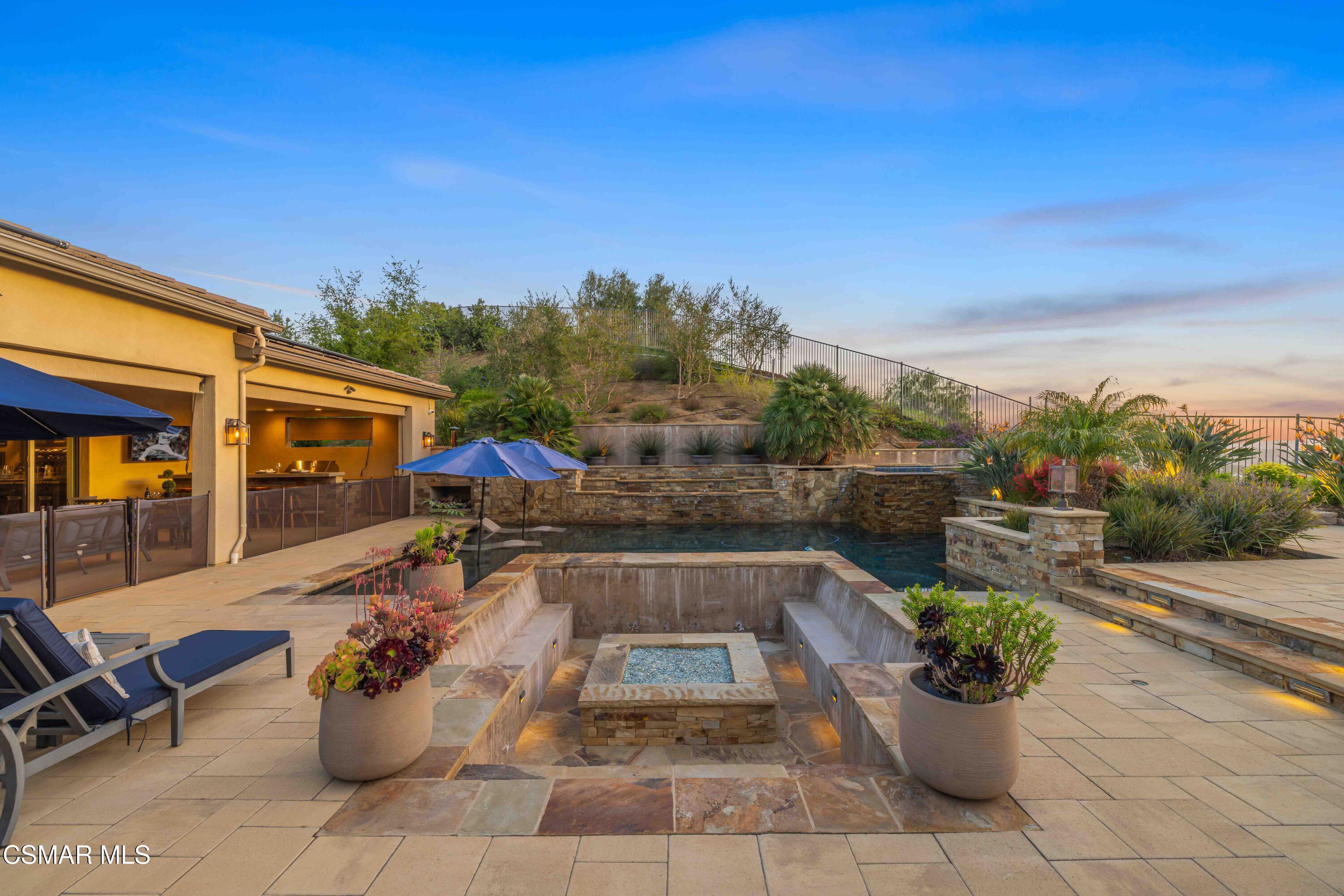 6508 High Country Place Moorpark, CA 93021 - Photo 76 of 95 a view of a patio with couches and potted plants