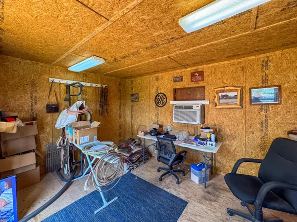 a room with furniture and wooden floor