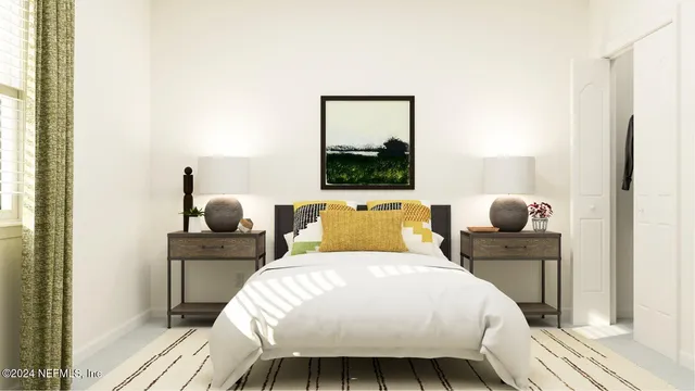 a bedroom with a bed and a potted plant