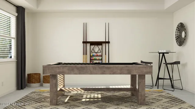 a living room with furniture and a rug