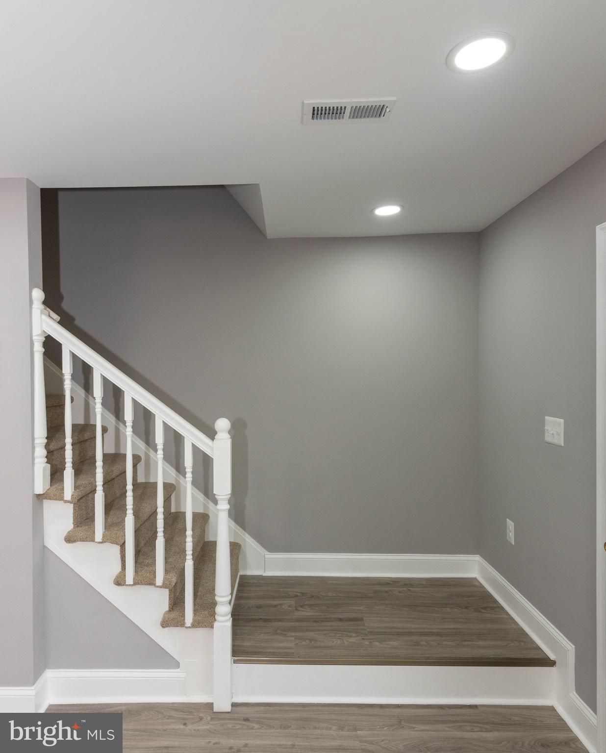 4843 Greencrest Road Baltimore, MD 21206 - Photo 16 of 44 a view of staircase with white walls
