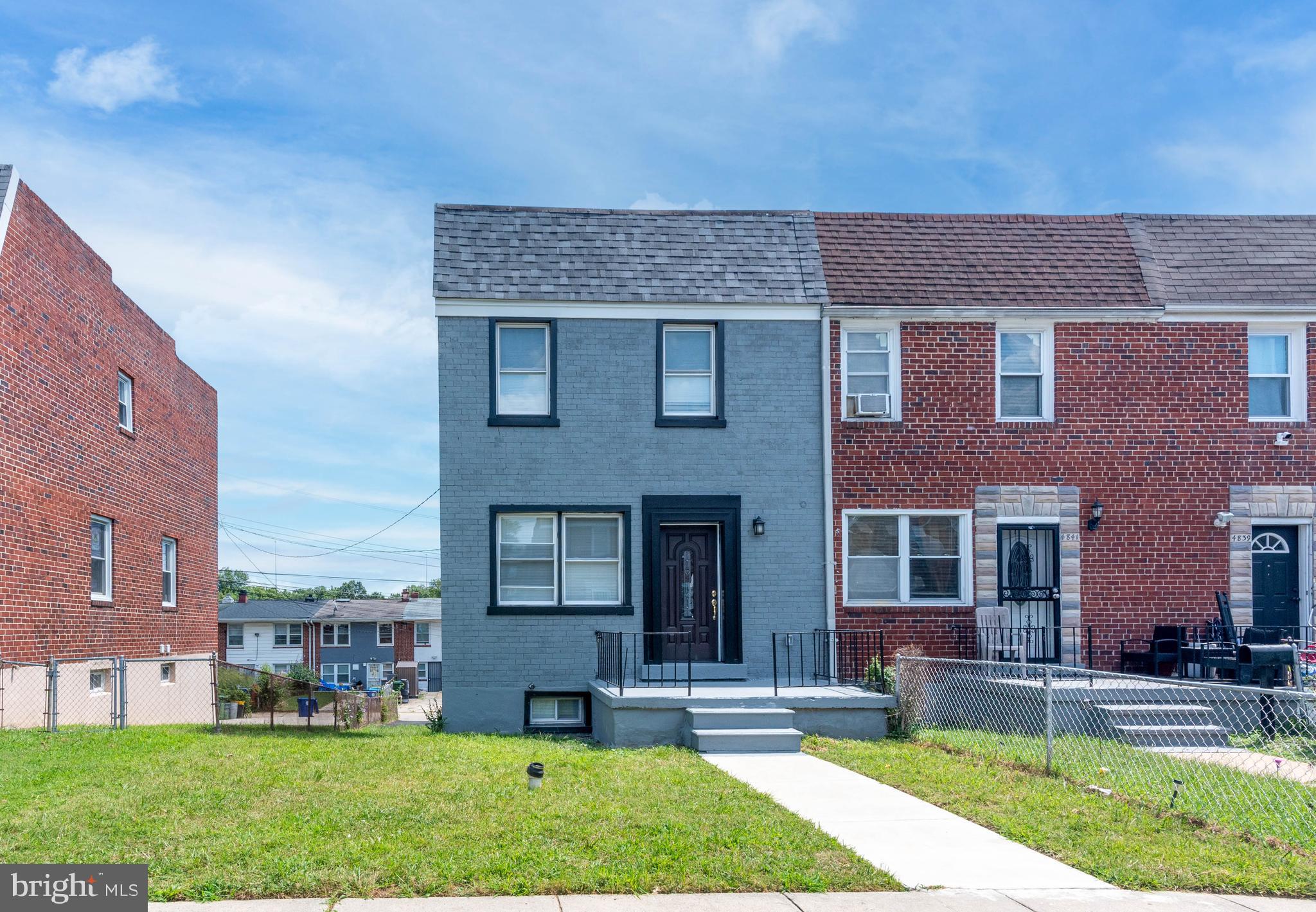 4843 Greencrest Road Baltimore, MD 21206 - Photo 44 of 44 a front view of a house with a yard