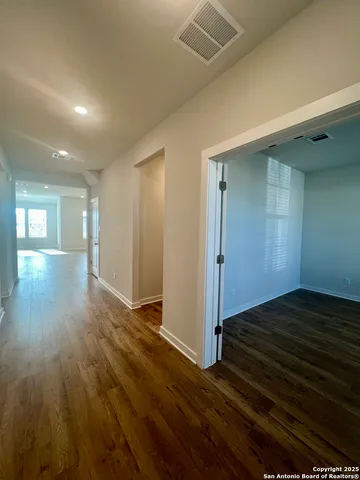a view of an empty room and window