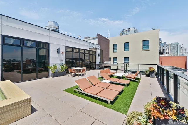 a reading room with furniture and flat screen tv