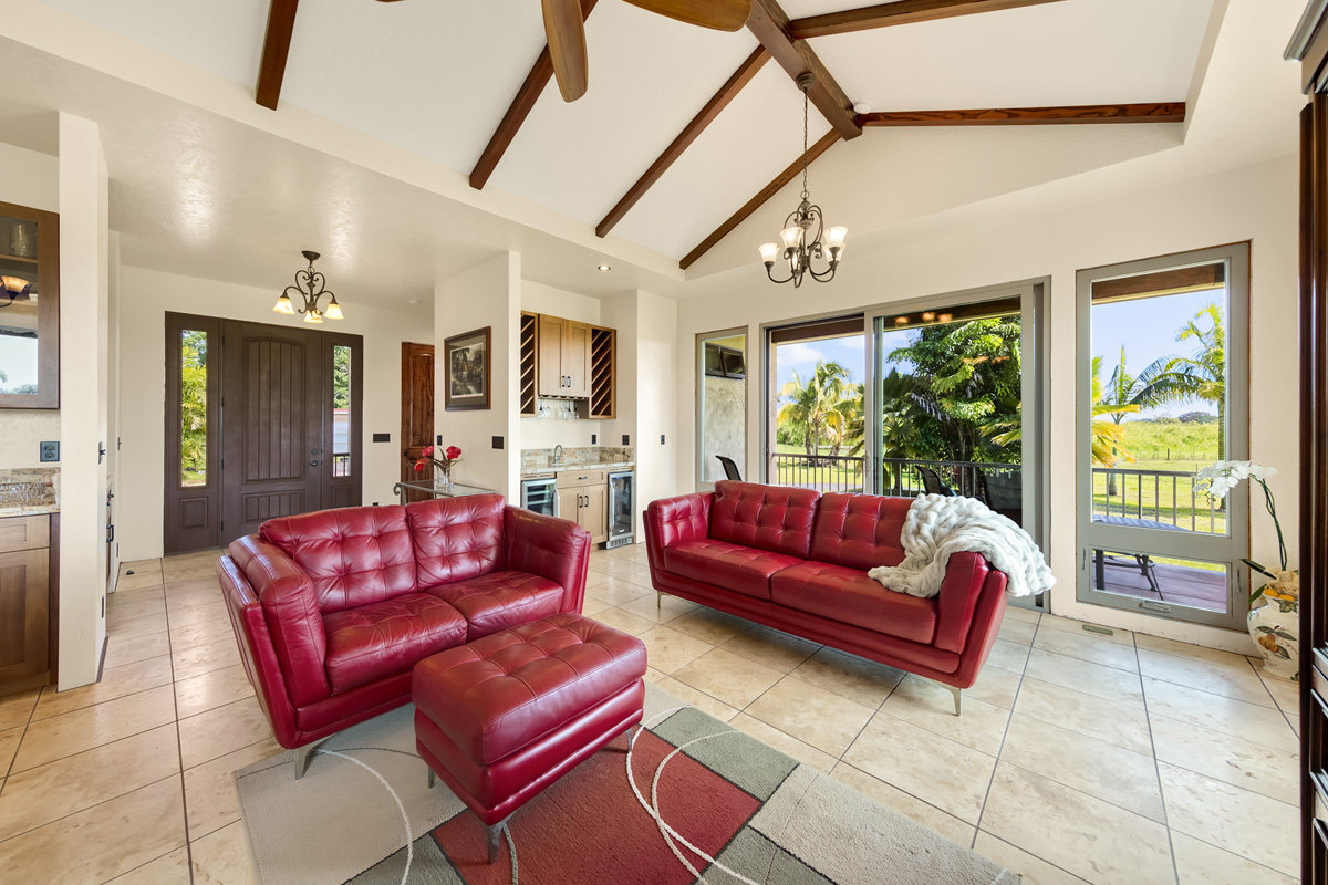 13-308 Kamaili Road Pahoa, HI 96778 - Photo 12 of 29 a living room with furniture and a flat screen tv