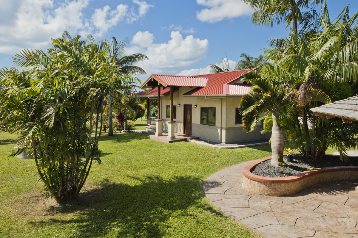 13-308 Kamaili Road Pahoa, HI 96778 - Photo 22 of 29 a front view of a house with garden