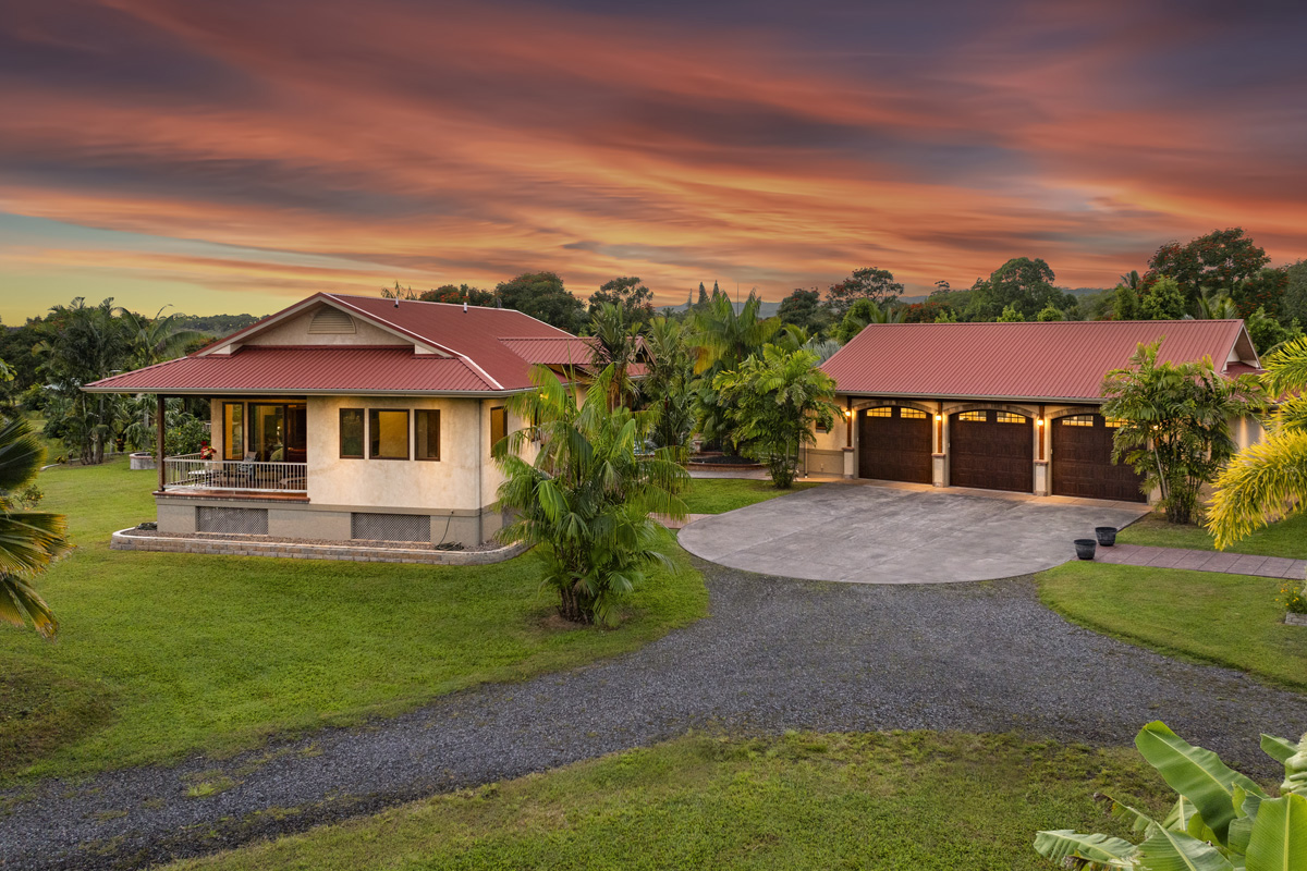 13-308 Kamaili Road Pahoa, HI 96778 - Photo 4 of 29 a front view of a house with a yard