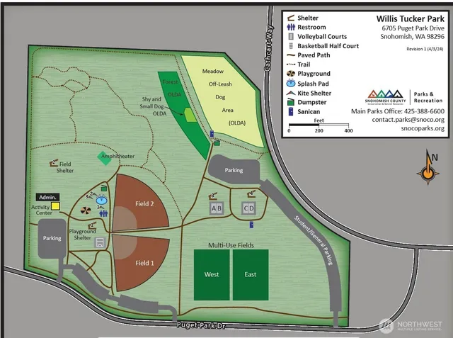 a sign board with an ocean view