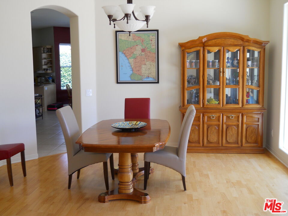 6 Thatcher Court Rancho Mirage, CA 92270 - Photo 11 of 25 a view of a workspace with furniture window and wooden floor