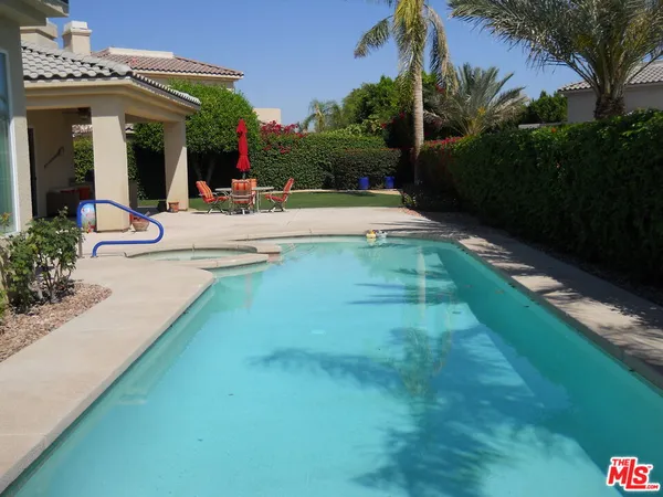 a view of a house with a swimming pool