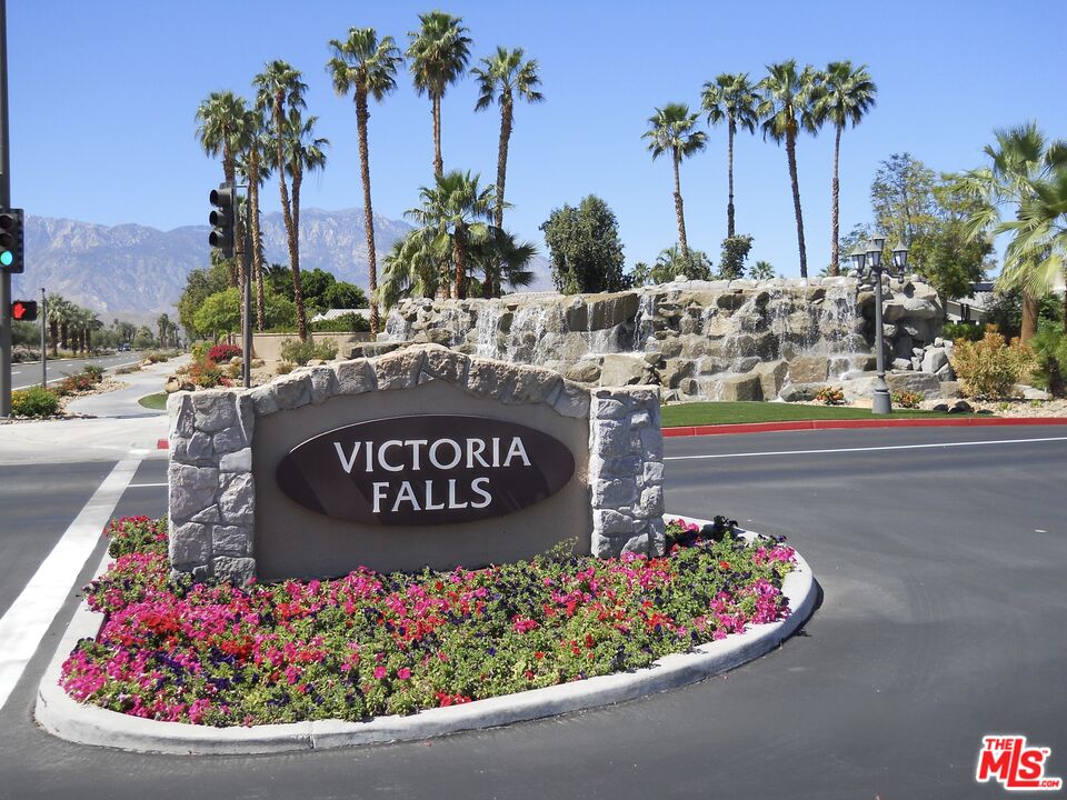 6 Thatcher Court Rancho Mirage, CA 92270 - Photo 3 of 25 a sign that is on the side of the road