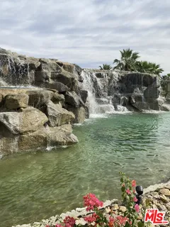 a house with a yard and a garage