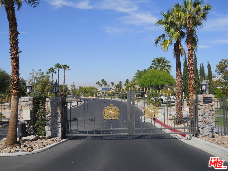 6 Thatcher Court Rancho Mirage, CA 92270 - Photo 5 of 25 a view of a street with palm trees