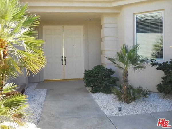 a view of a house with a plants