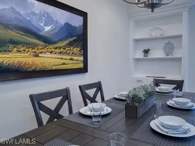 a view of a dining room and livingroom view