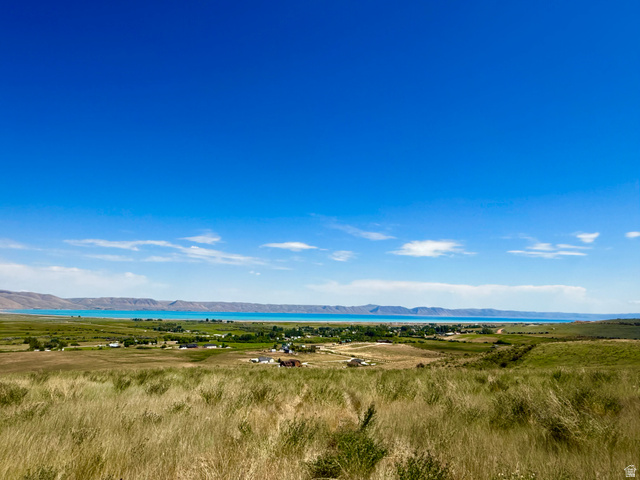 160 Dry Canyon St. Charles, ID 83272 - Photo 4 of 63 Expansive land featuring a grassy field with distant water