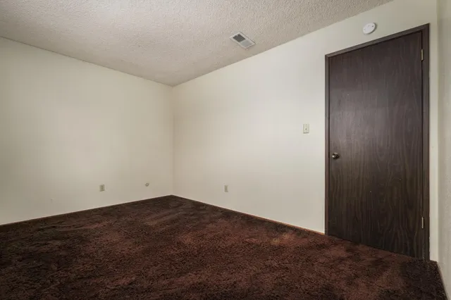 an empty room with closet