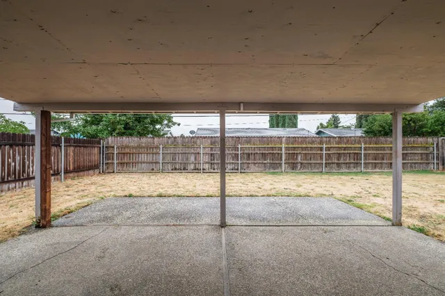 a house with trees in the background
