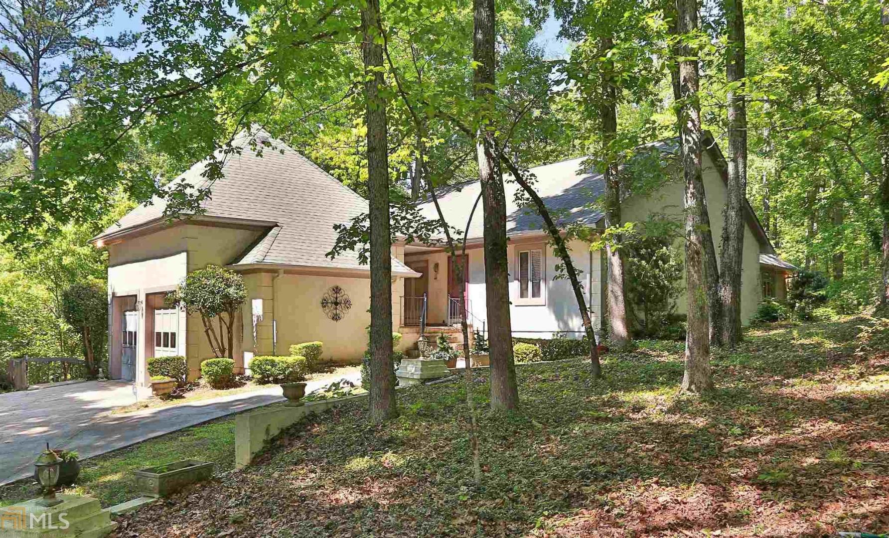 654 Pine Needle Road Hampton, GA 30228 - Photo 1 of 1 a view of a house with a backyard