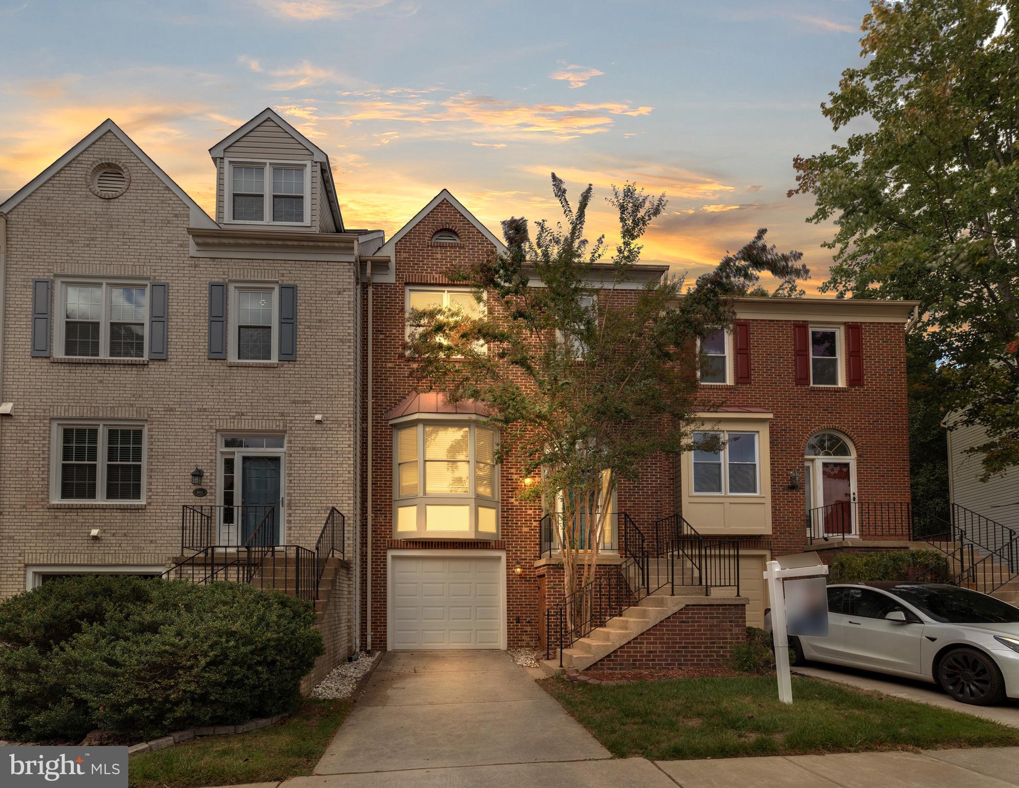 8110 Squirrel Run Road Springfield, VA 22152 - Photo 1 of 53 a front view of a house with a yard