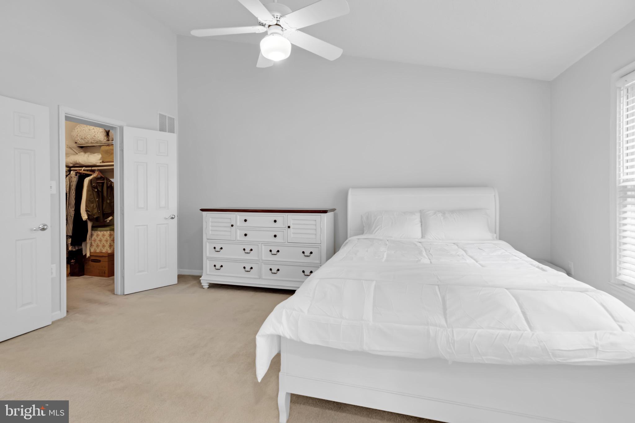 8110 Squirrel Run Road Springfield, VA 22152 - Photo 21 of 53 a bedroom with a bed and a view