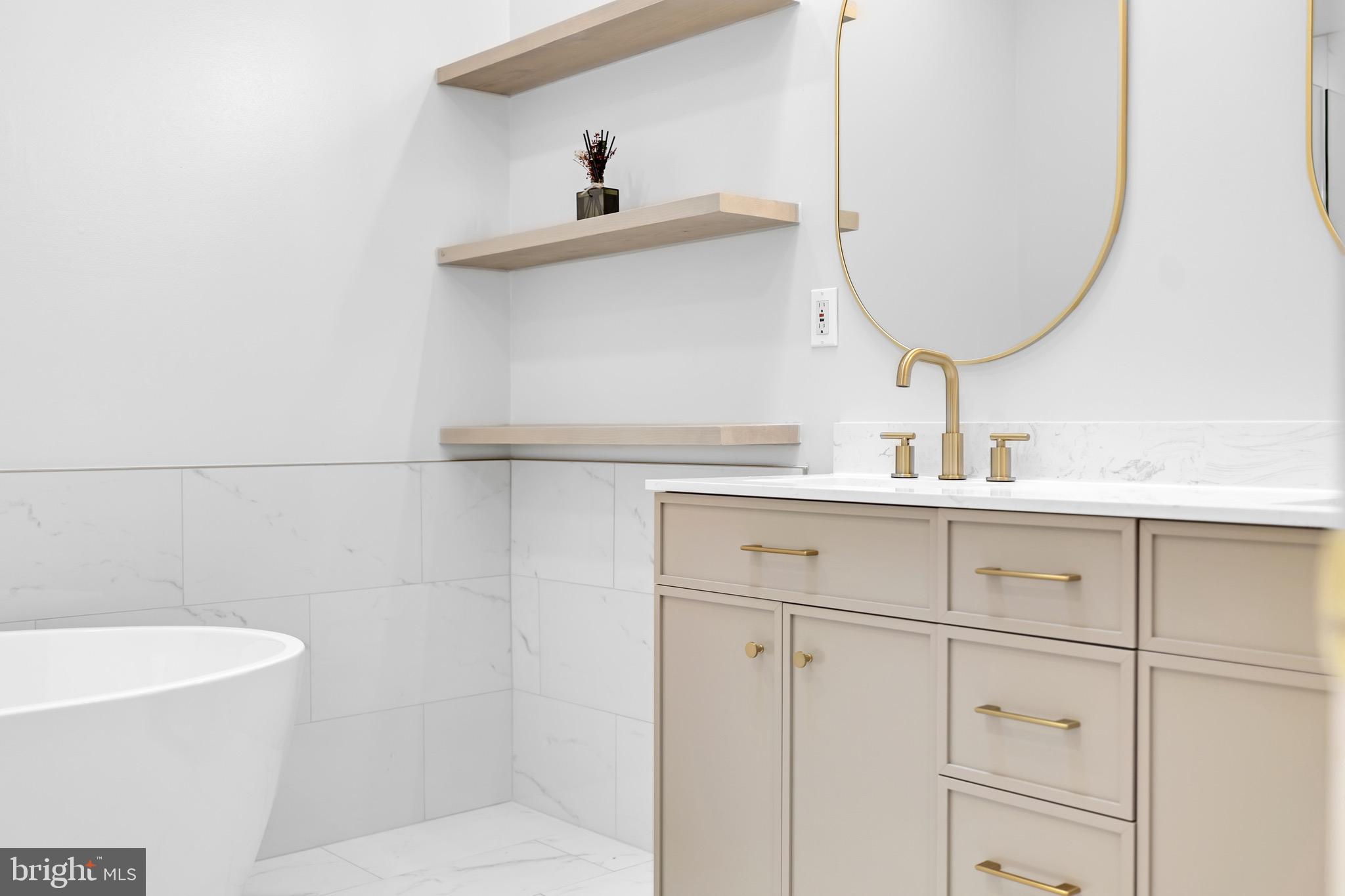 8110 Squirrel Run Road Springfield, VA 22152 - Photo 24 of 53 a bathroom with a sink and a mirror