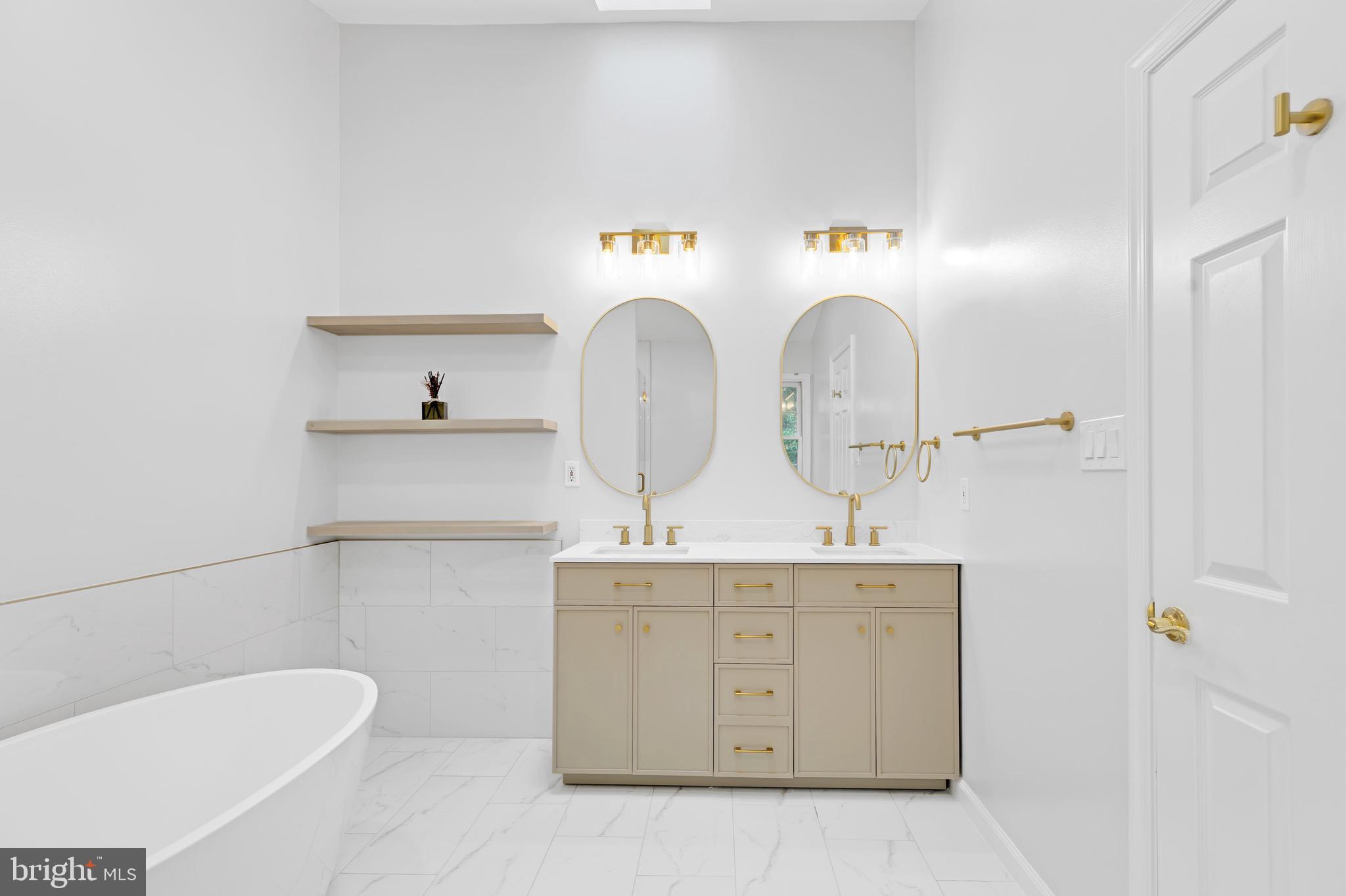 8110 Squirrel Run Road Springfield, VA 22152 - Photo 28 of 53 a bathroom with a toilet sink and mirror