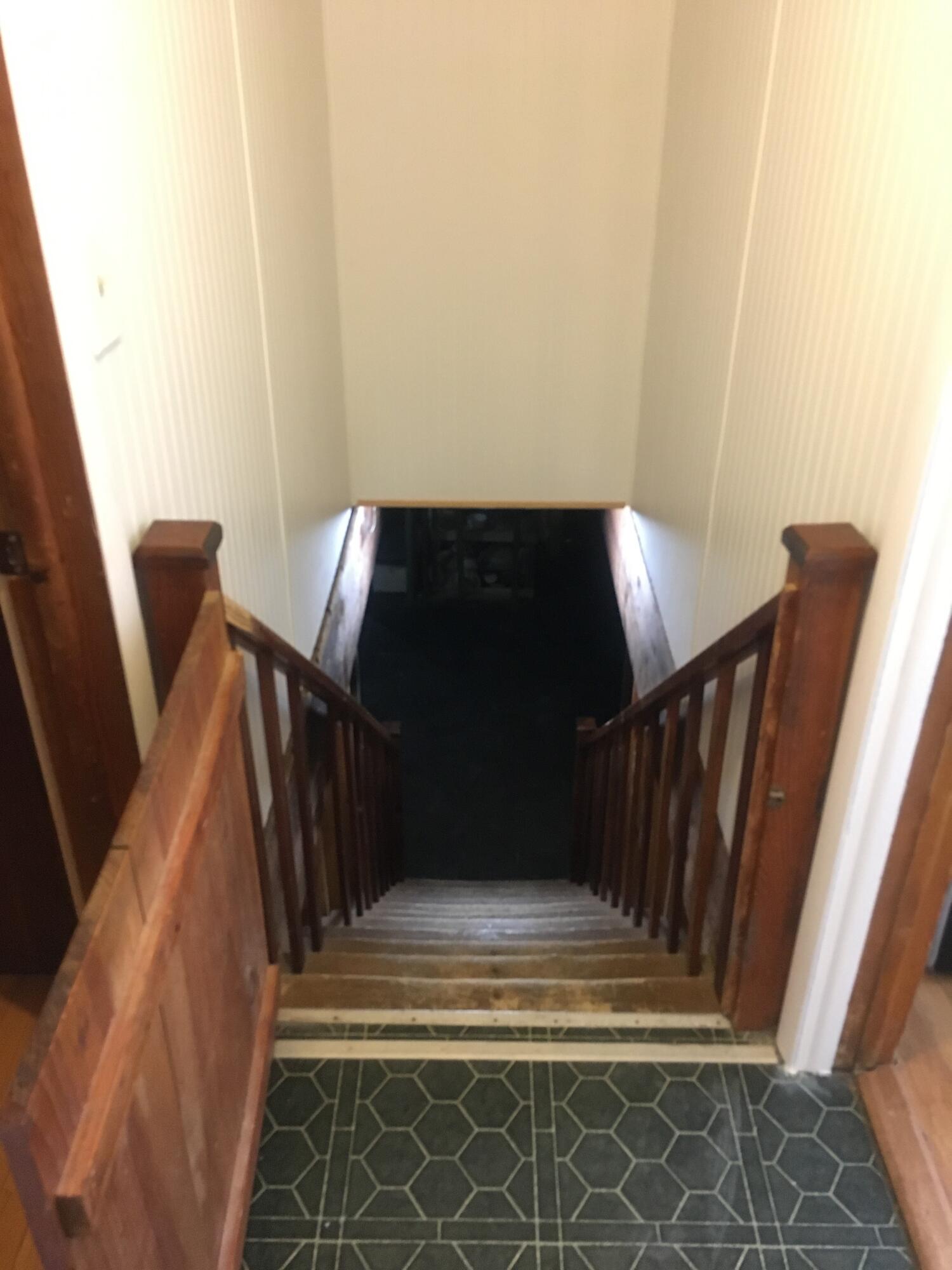 9188 Erdman Road Onekama, MI 49675 - Photo 27 of 33 basement stairway