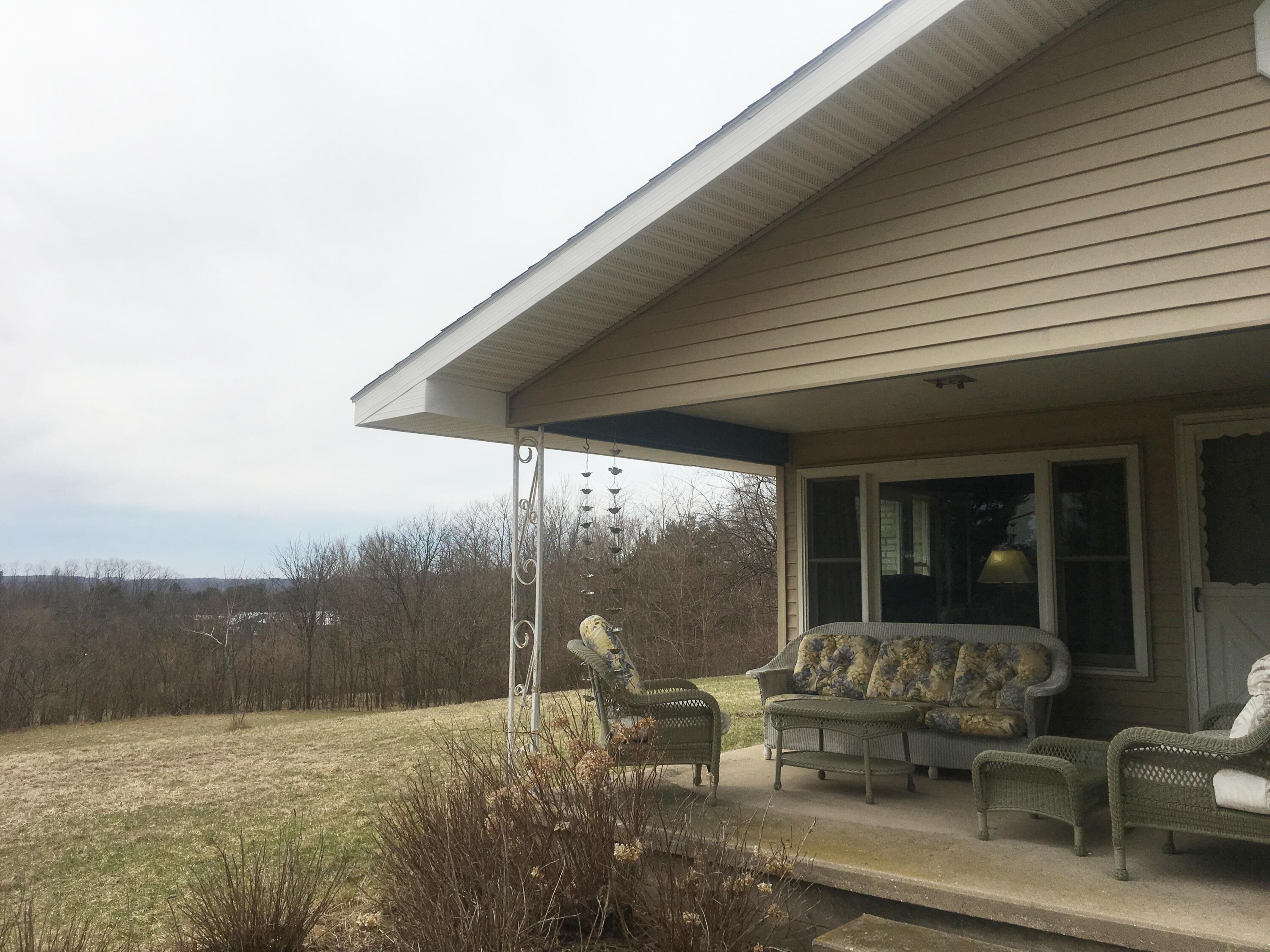 9188 Erdman Road Onekama, MI 49675 - Photo 32 of 33 Front porch view