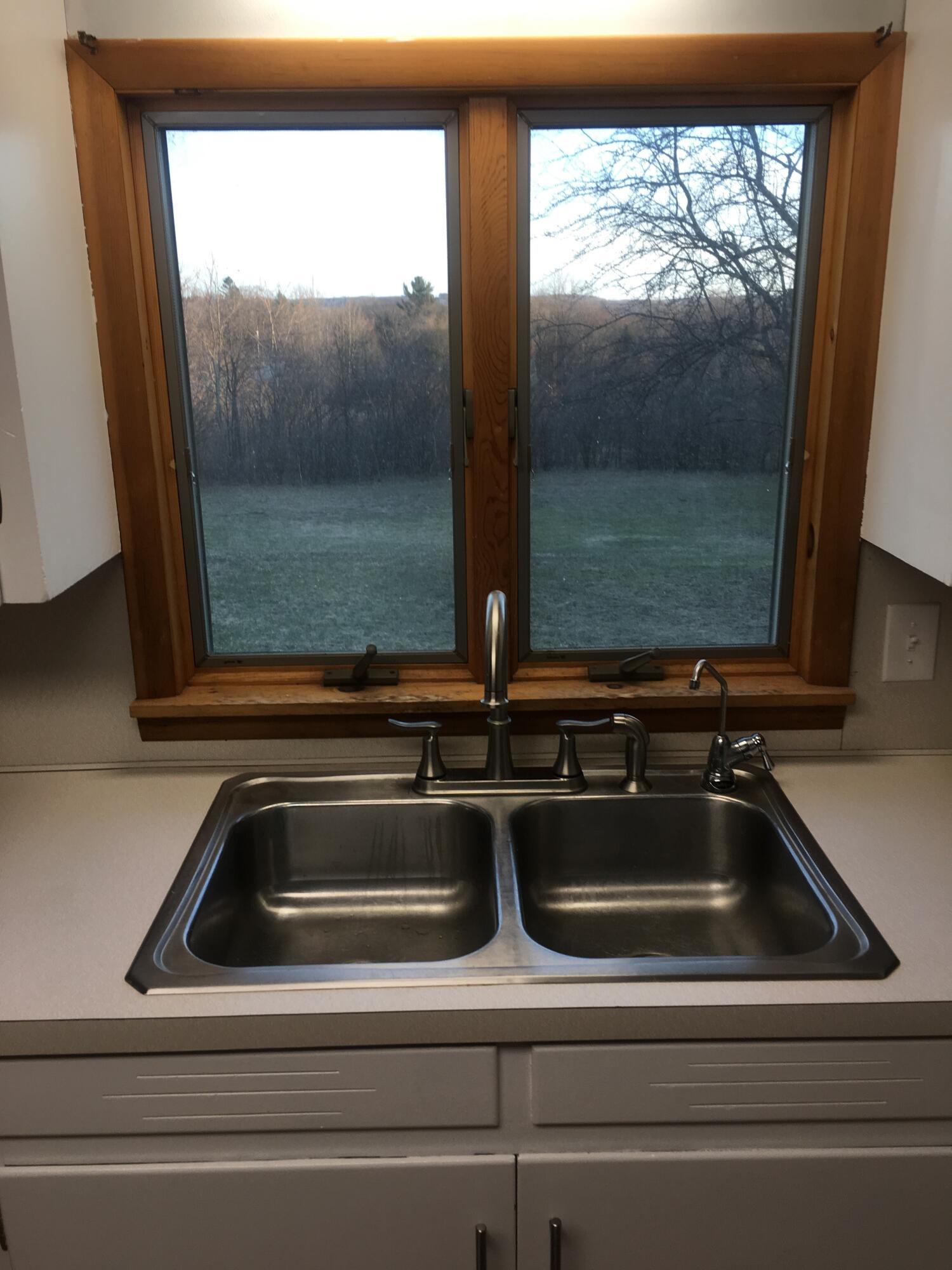 9188 Erdman Road Onekama, MI 49675 - Photo 8 of 33 view from kitchen sink