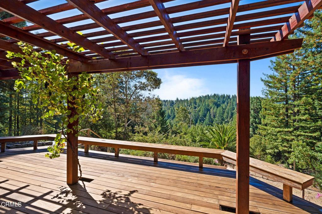 a view of a back yard from a balcony