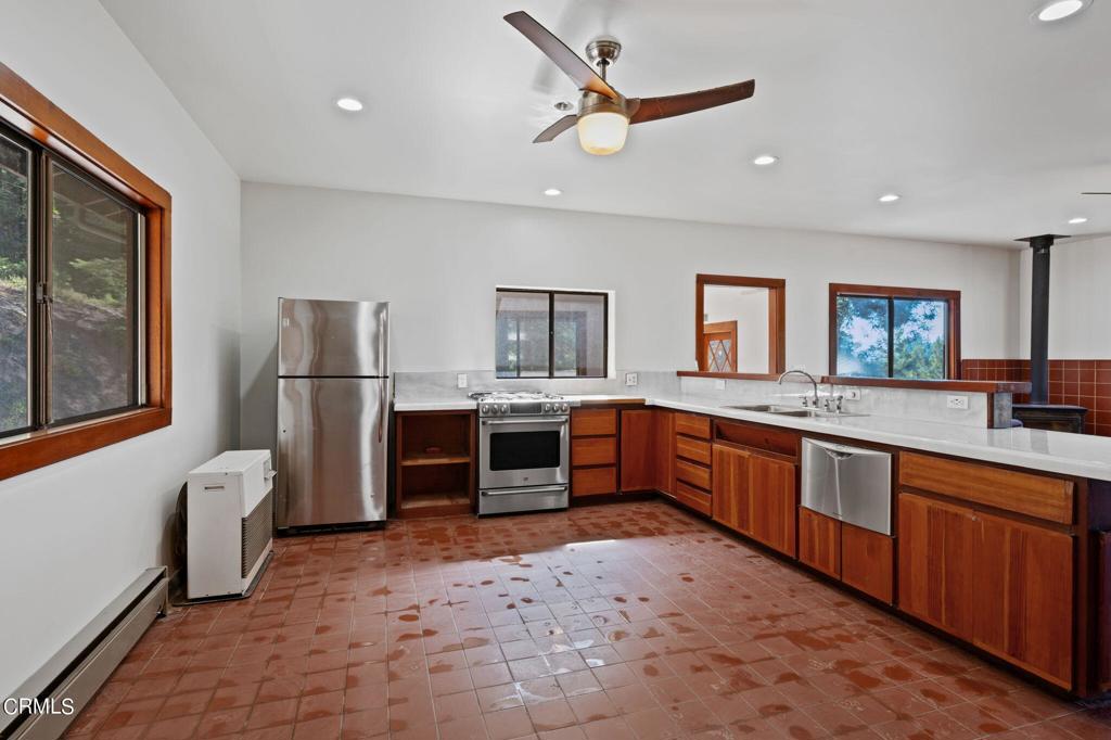 19200 Tramway Navarro, CA 95463 - Photo 14 of 50 a large kitchen with stainless steel appliances a refrigerator and a sink