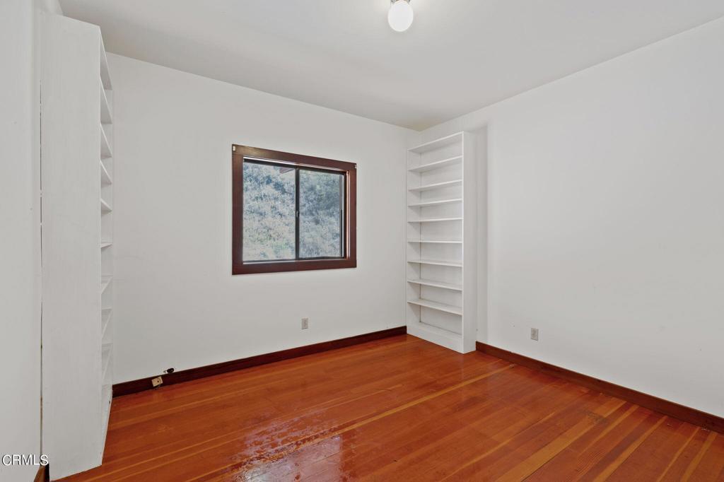 19200 Tramway Navarro, CA 95463 - Photo 31 of 50 a view of an empty room with wooden floor and a window