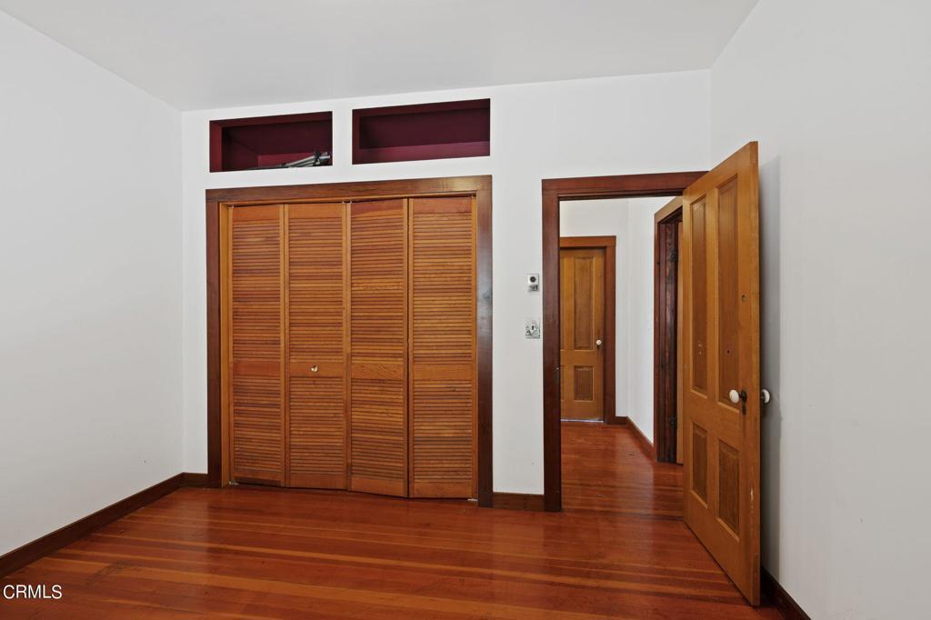 19200 Tramway Navarro, CA 95463 - Photo 32 of 50 an empty room with wooden floor and closet
