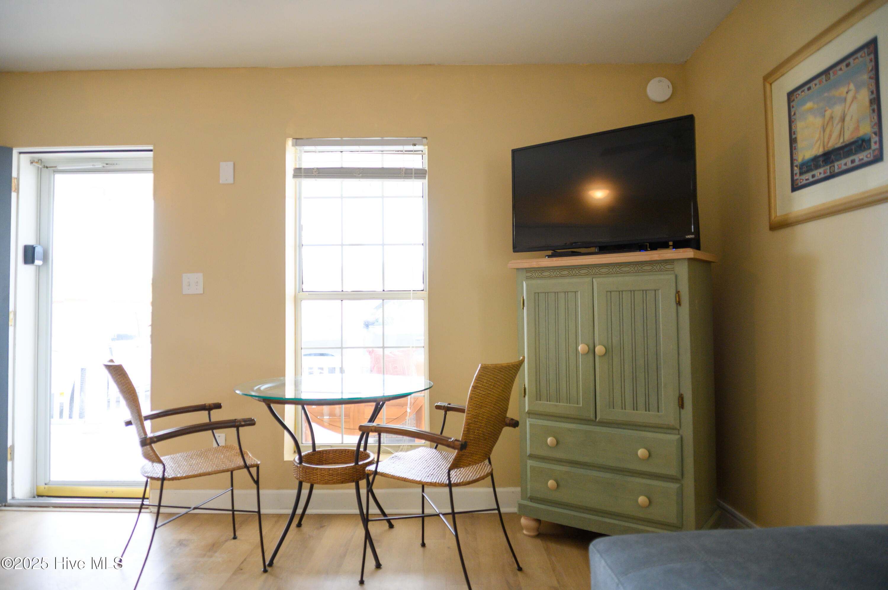 201 Henderson Boulevard, Unit 1 Atlantic Beach, NC 28512 - Photo 9 of 14 Bistro-Style Dining Seating for Two