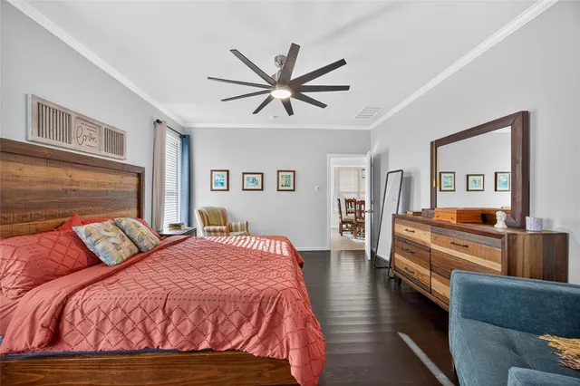 a bedroom with a bed and furniture