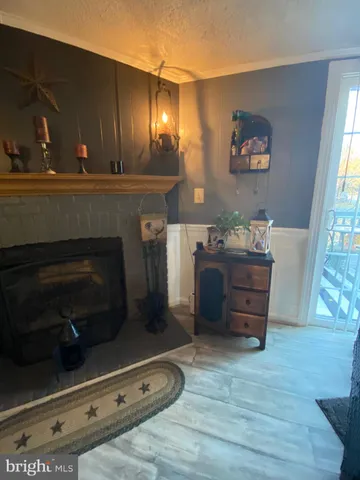 a bathroom with a sink toilet and a mirror