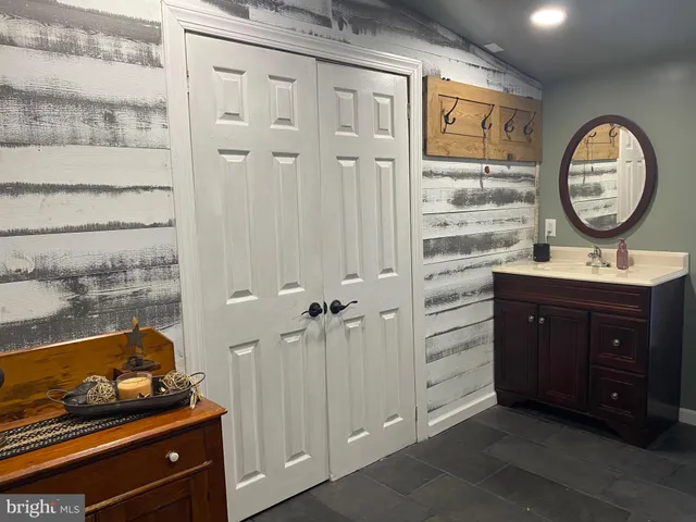 a bathroom with a toilet and a sink