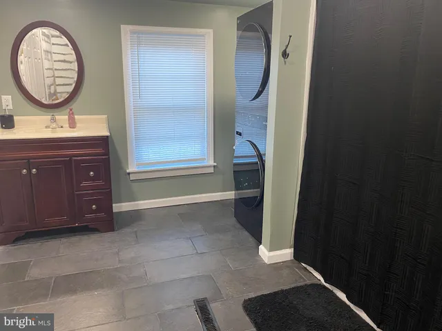 a bathroom with a bathtub