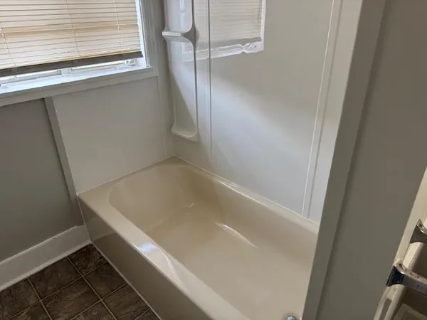 a bathroom with a bathtub