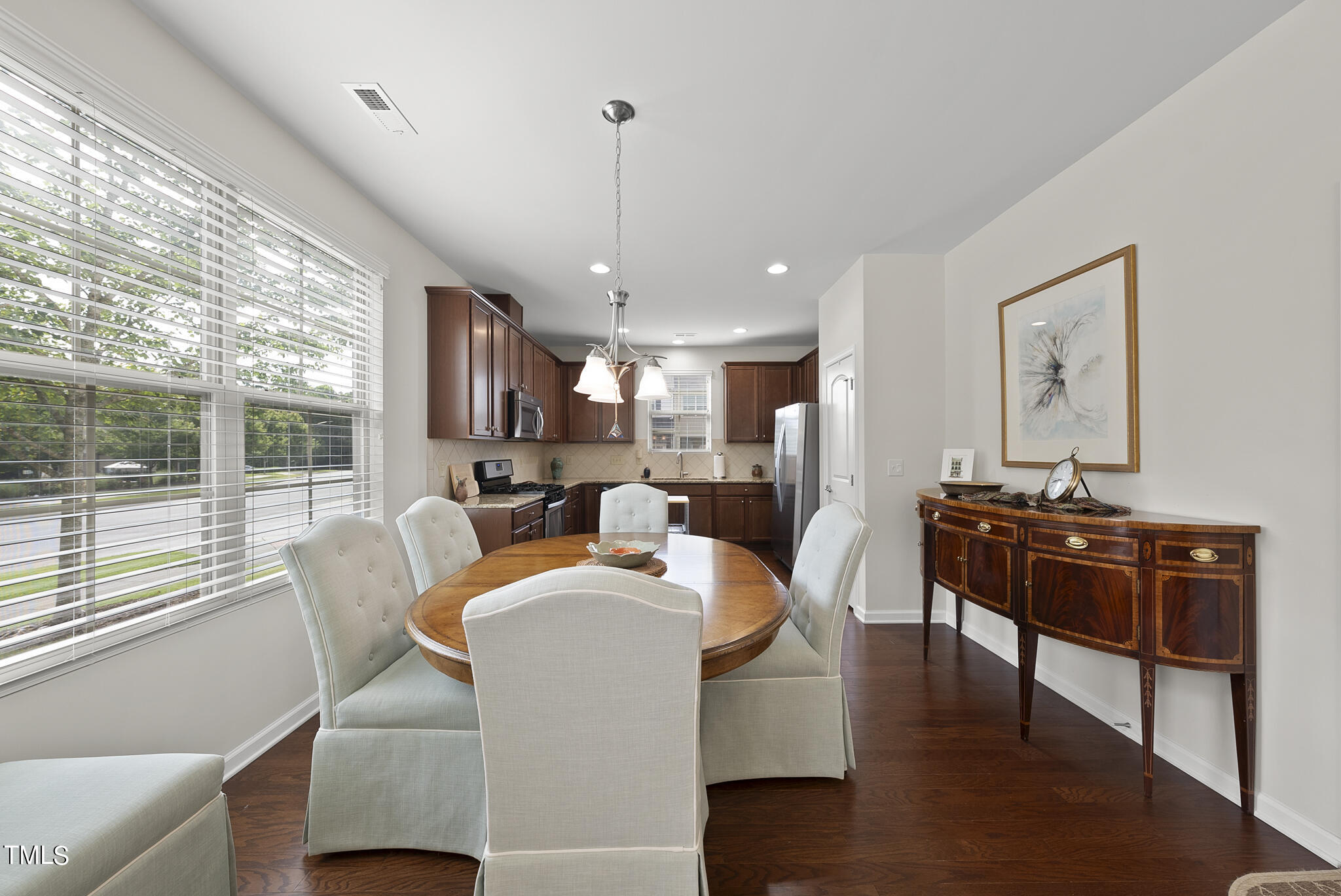 2 Intuition Circle Durham, NC 27705 - Photo 14 of 33 a view of a dining room with furniture window and wooden floor