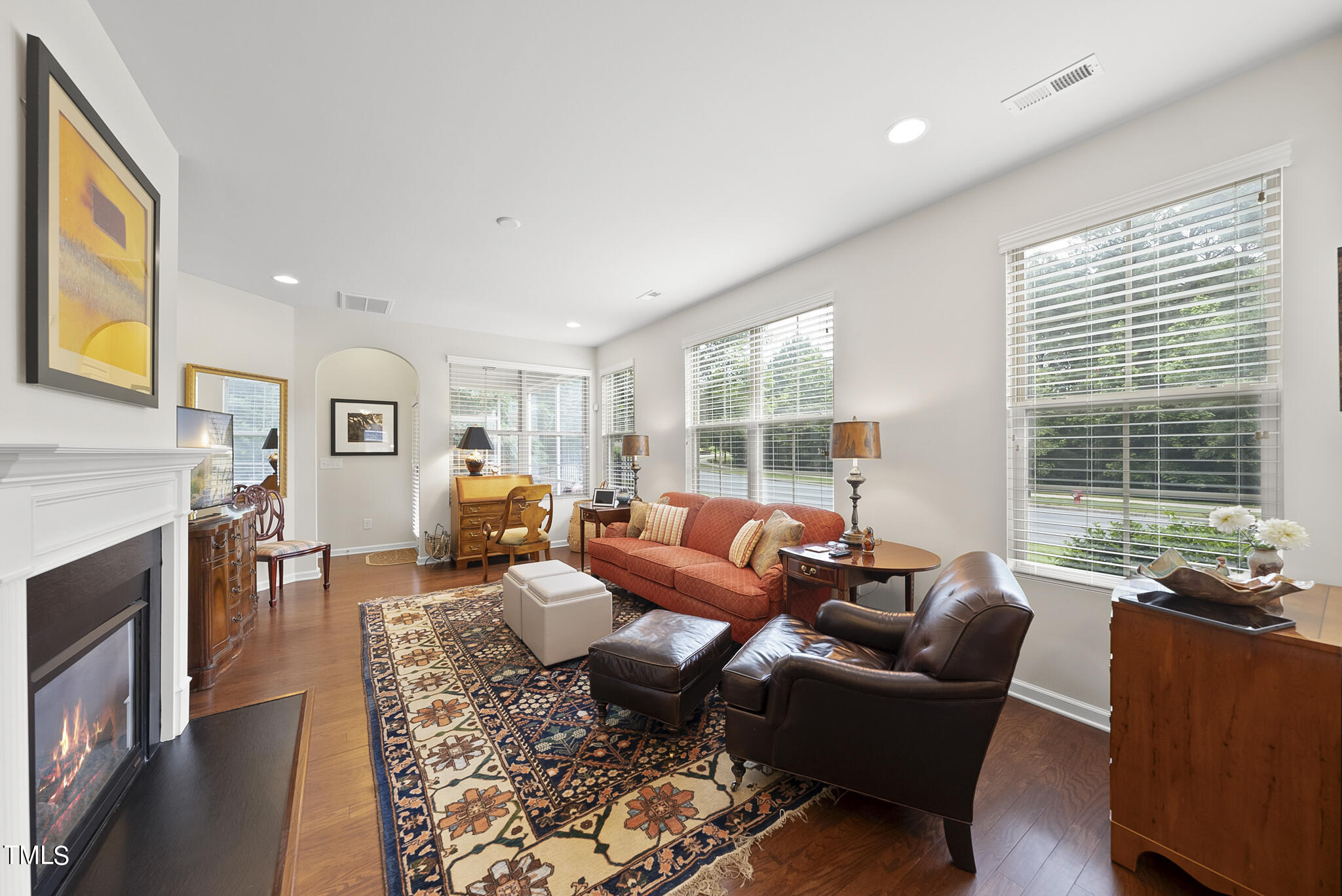 2 Intuition Circle Durham, NC 27705 - Photo 18 of 33 a living room with furniture fireplace and a large window