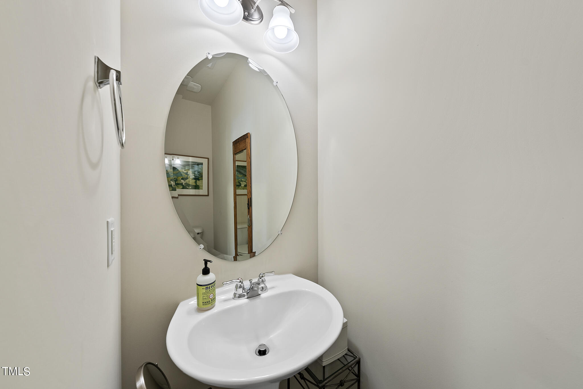 2 Intuition Circle Durham, NC 27705 - Photo 19 of 33 a bathroom with a sink and a mirror